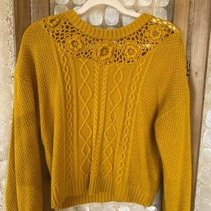 knit yellow sweater